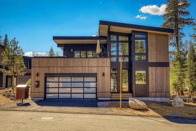 a view of front door and small yard
