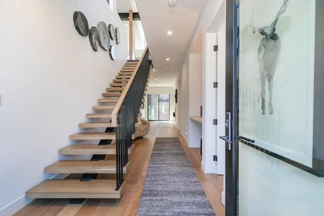 a view of entryway with wooden floor