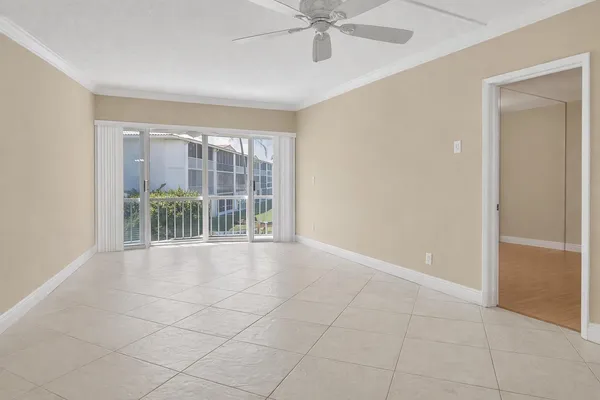 a bedroom with a bed dresser and a window