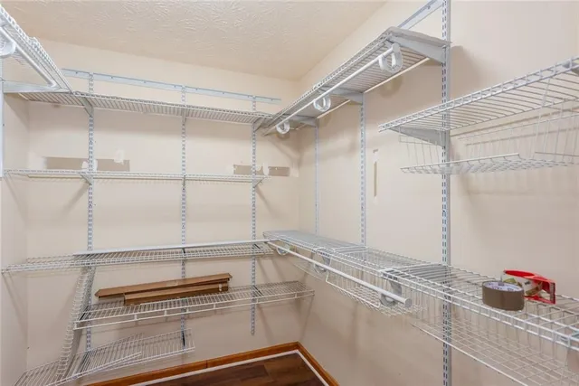 a bathroom with a shower and vanity