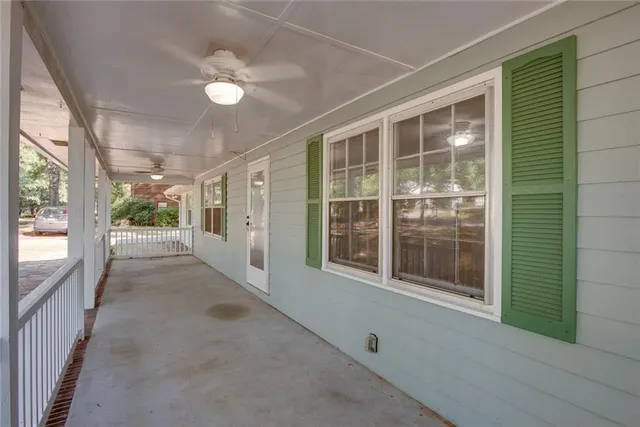 a view of a glass door and the balcony