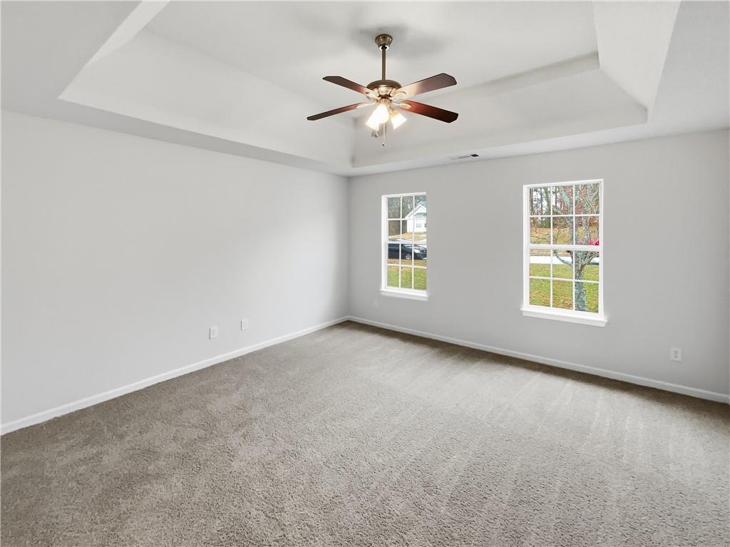 836 Tara Bend Hampton, GA 30228 - Photo 15 of 25 a view of an empty room with a window