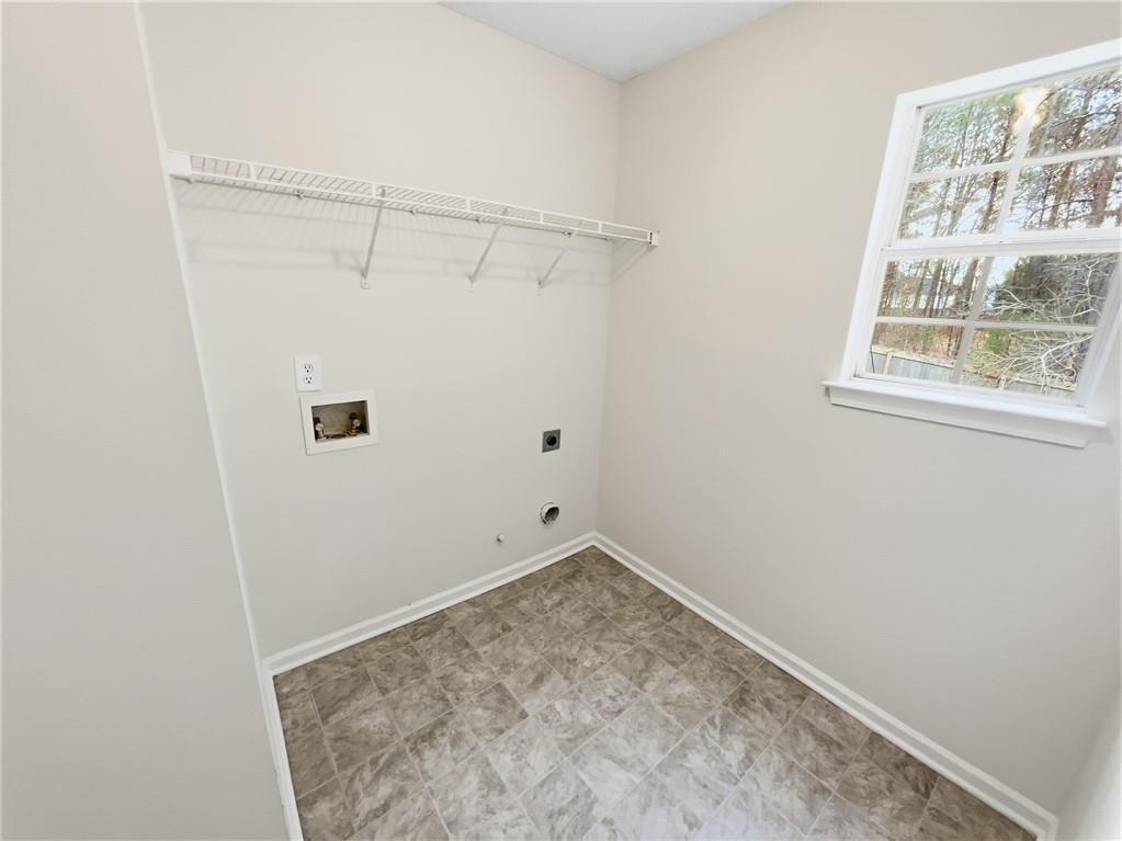 836 Tara Bend Hampton, GA 30228 - Photo 17 of 25 a view of small space with racks on the wall