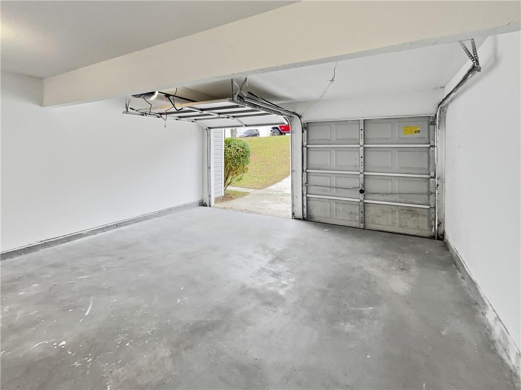 836 Tara Bend Hampton, GA 30228 - Photo 21 of 25 a view of a garage