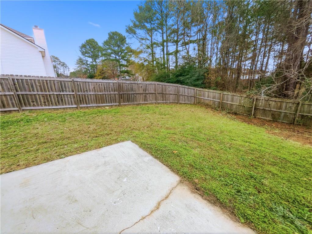 836 Tara Bend Hampton, GA 30228 - Photo 23 of 25 a view of a backyard with a lake view