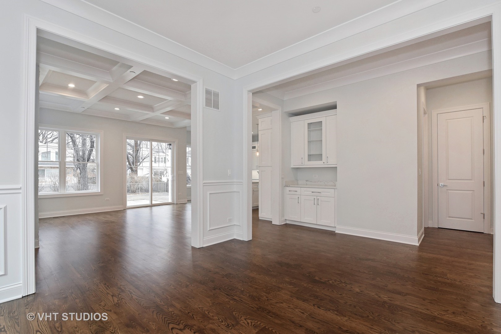 2424 Illinois Road Northbrook, IL 60062 - Photo 2 of 14 a view of an empty room with wooden floor and a window