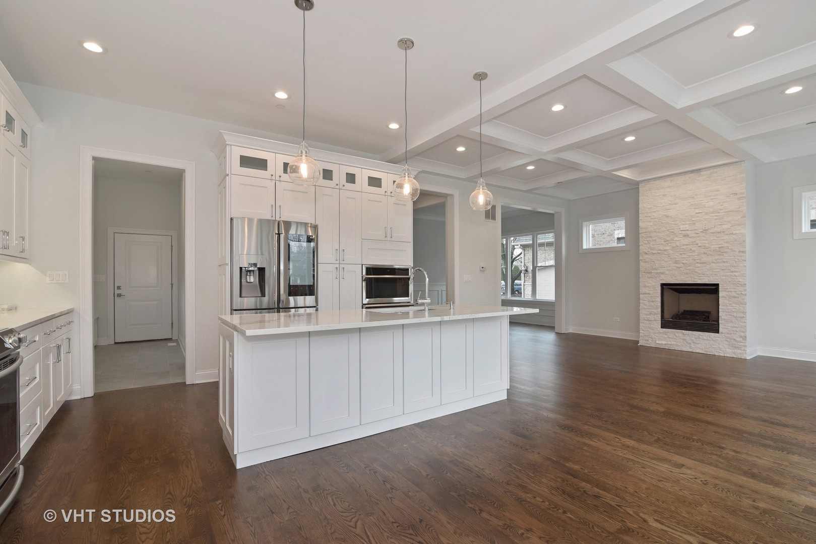 2424 Illinois Road Northbrook, IL 60062 - Photo 6 of 14 a view of a kitchen with a sink and refrigerator