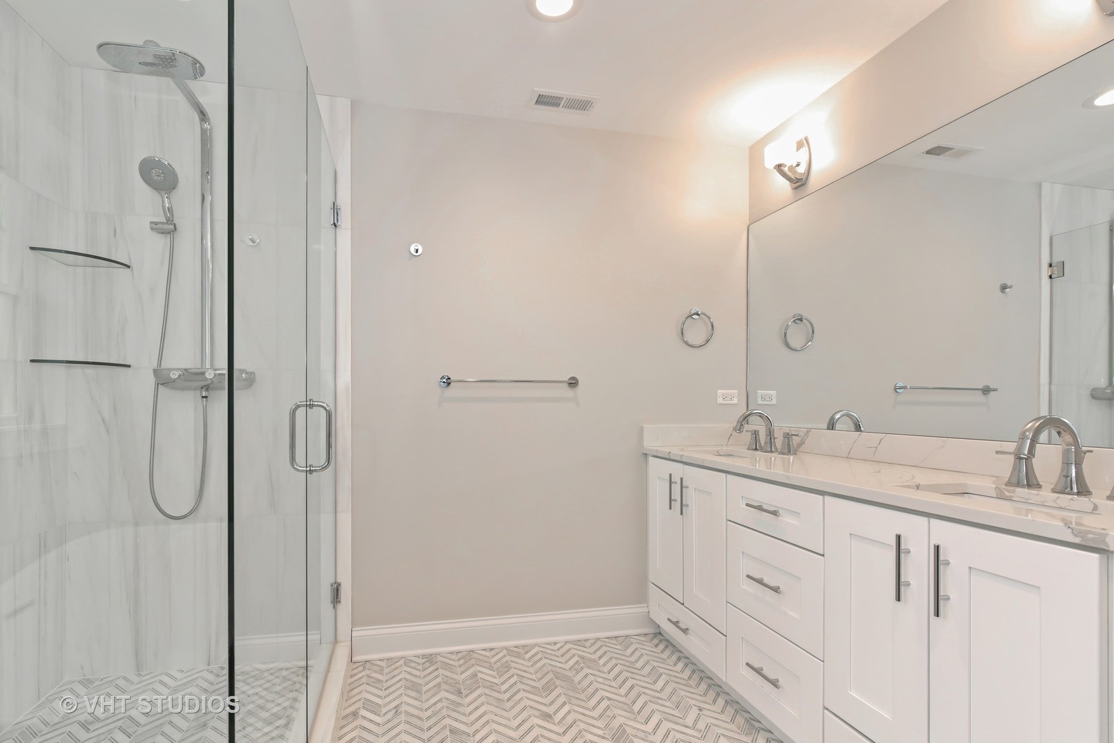 2424 Illinois Road Northbrook, IL 60062 - Photo 10 of 14 a bathroom with a double vanity sink mirror and shower