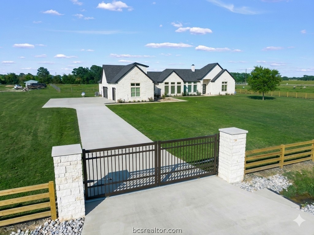 Drive through your private solar gated entry.  Or use the back entrnce.  This brand new exclusive Hudson Farms home and community offers the safety of a luxury subdivision without the claustrophobia of zero-lot-line city developments.  Your own refined gentlmans ranch with room to expand and develop in your own way.  It's already fenced & cross Fenced,  Take your time...it's all ready for move in.  Approx 8 minutes to Hiway 6 in Bryan, TX.  This is the first house on the right as you enter Hudson Farms Rd.