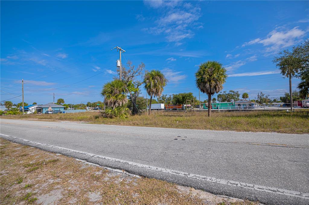 800 South McCall Road Englewood, FL 34223 - Photo 13 of 15 a view of a lake with outdoor space