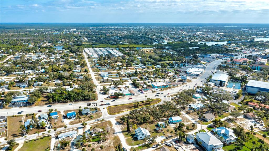 800 South McCall Road Englewood, FL 34223 - Photo 9 of 15 an aerial view of residential houses with city view