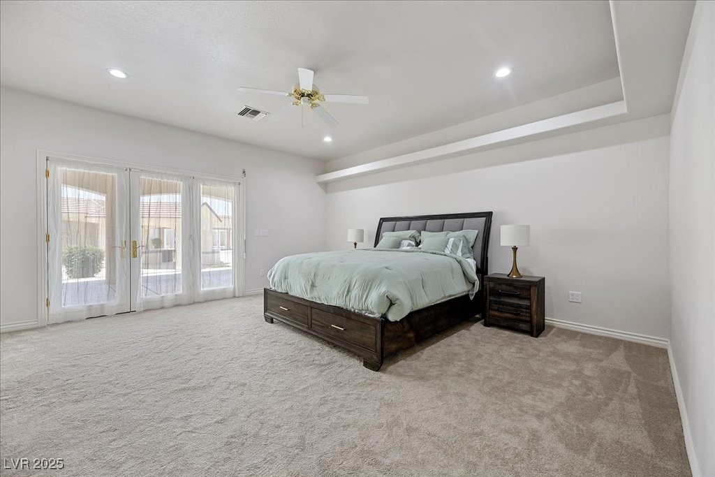 640 Quail Covey Road Henderson, NV 89002 - Photo 32 of 75 4th Endsuite Bedroom with access to Backyard, carpet, recessed lighting, a ceiling fan, and french doors with Rolladen Shutters