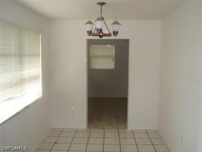107 Oregon Road West Lehigh Acres, FL 33936 - Photo 5 of 10 a view of an entryway
