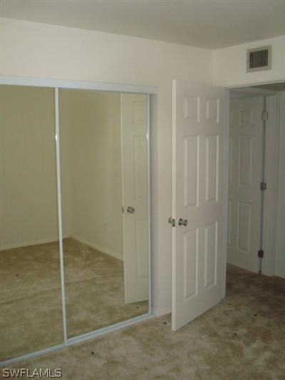 107 Oregon Road West Lehigh Acres, FL 33936 - Photo 8 of 10 a view of an empty room