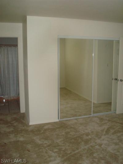 107 Oregon Road West Lehigh Acres, FL 33936 - Photo 9 of 10 a view of an empty room