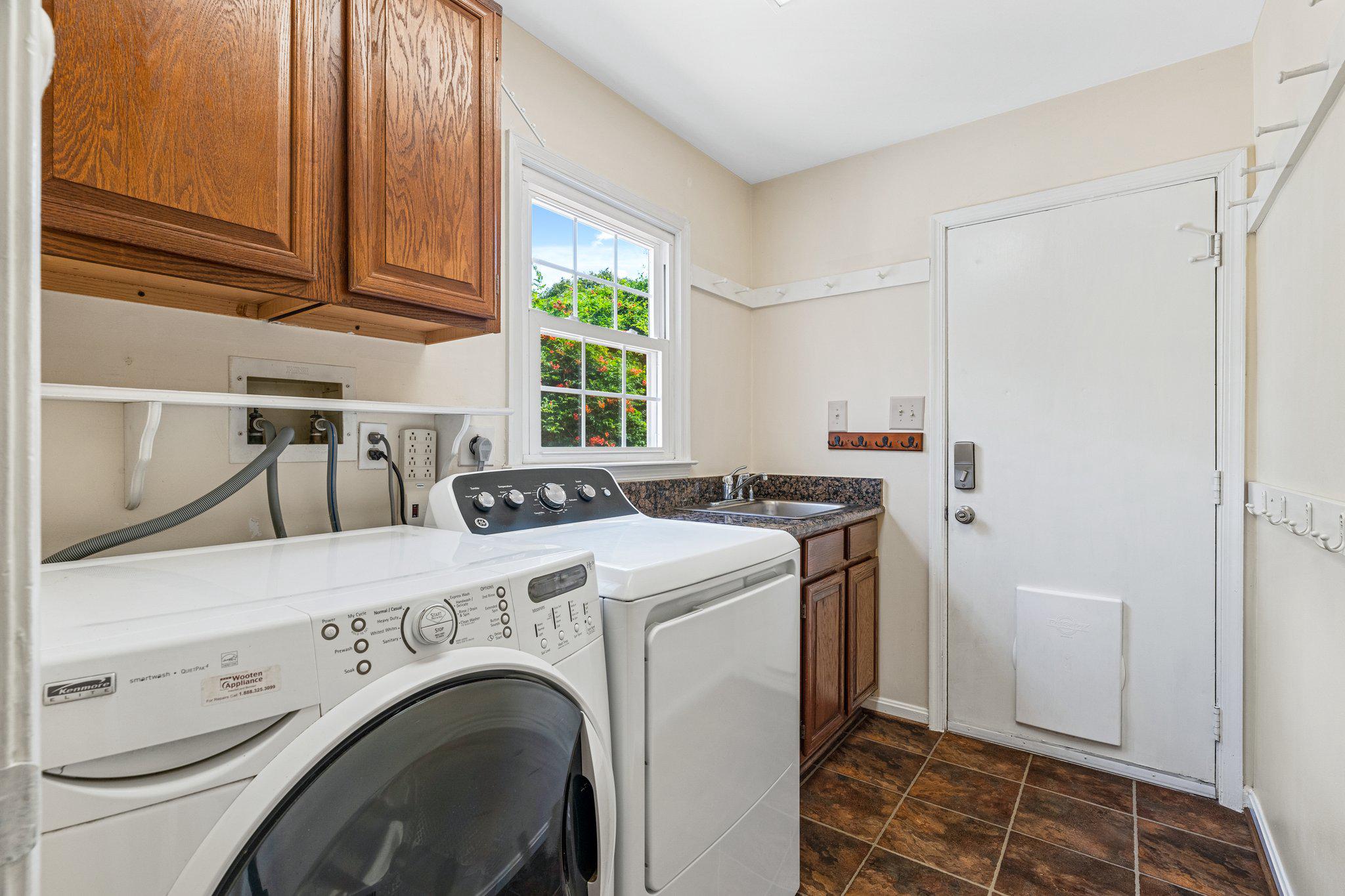 12400 Triple Crown Road Gaithersburg, MD 20878 - Photo 17 of 45 Main-level Laundry and Garage Entryway