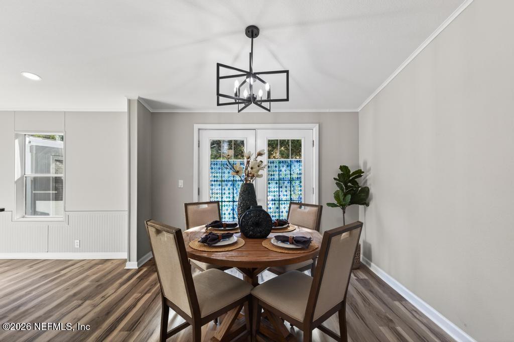 216 Yucca Street Middleburg, FL 32068 - Photo 13 of 60 a view of a dining room with furniture window and outside view