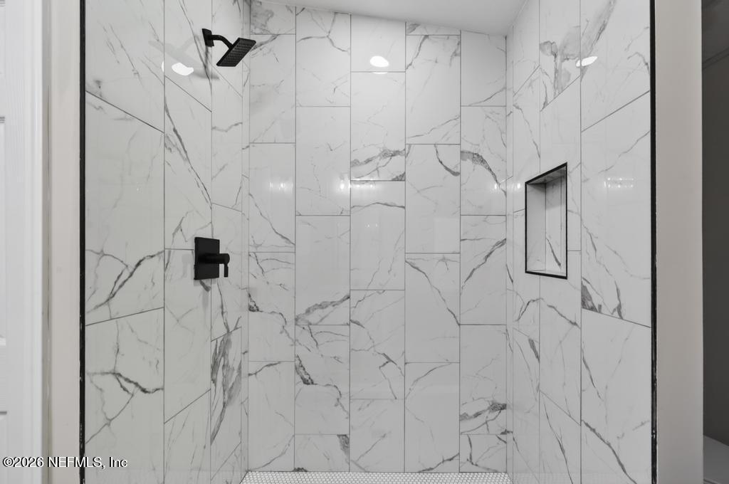 216 Yucca Street Middleburg, FL 32068 - Photo 35 of 60 a bathroom with a shower