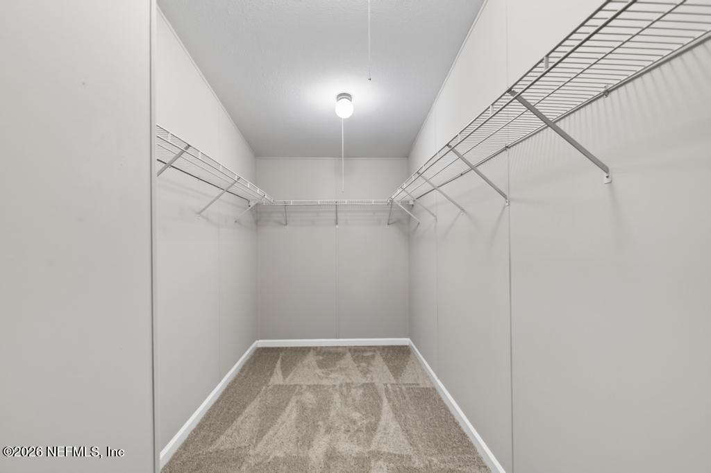 216 Yucca Street Middleburg, FL 32068 - Photo 38 of 60 a view of a room with racks on the wall