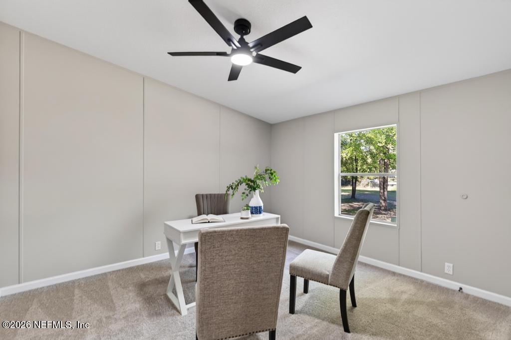 216 Yucca Street Middleburg, FL 32068 - Photo 41 of 60 a dining room with furniture and window