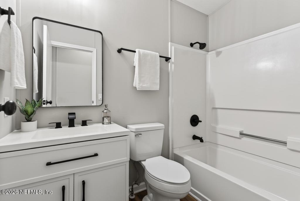 216 Yucca Street Middleburg, FL 32068 - Photo 43 of 60 a bathroom with a sink toilet and shower