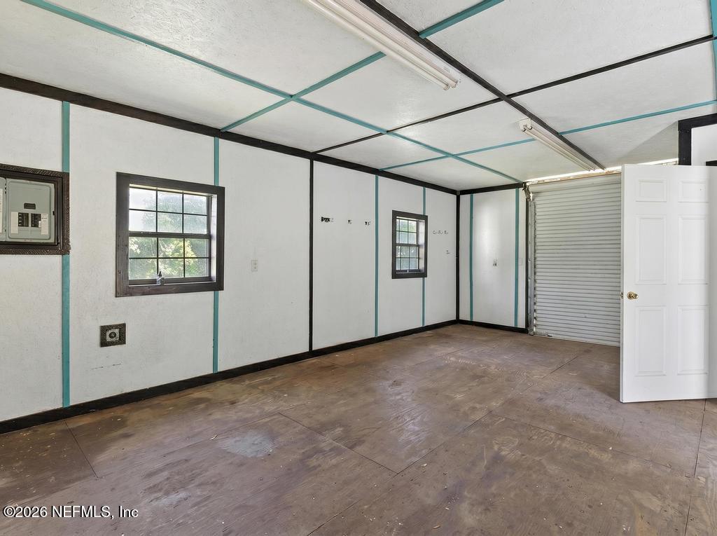 216 Yucca Street Middleburg, FL 32068 - Photo 56 of 60 a view of an empty room with windows