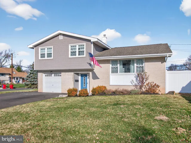 a front view of house with yard