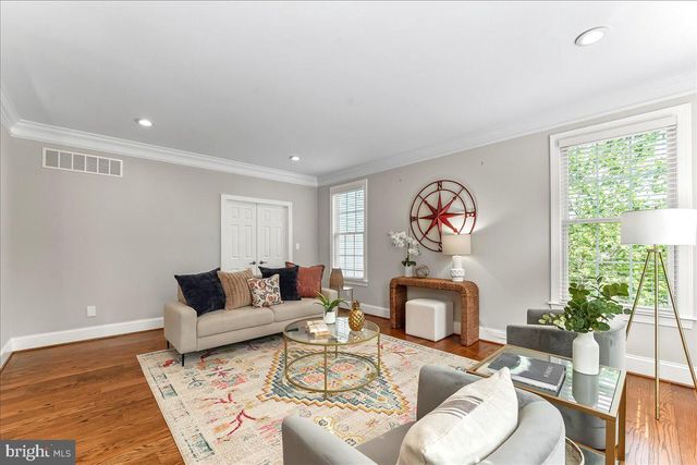 a bathroom with double sink and a mirror