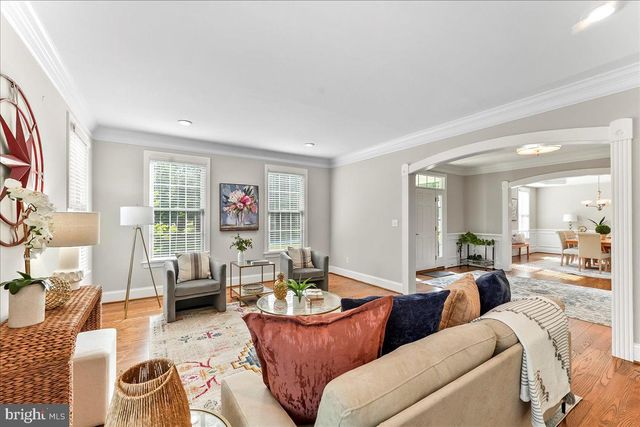 a spacious bathroom with a granite countertop shower a sink and a mirror