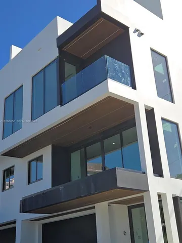 a view of swimming pool from a balcony