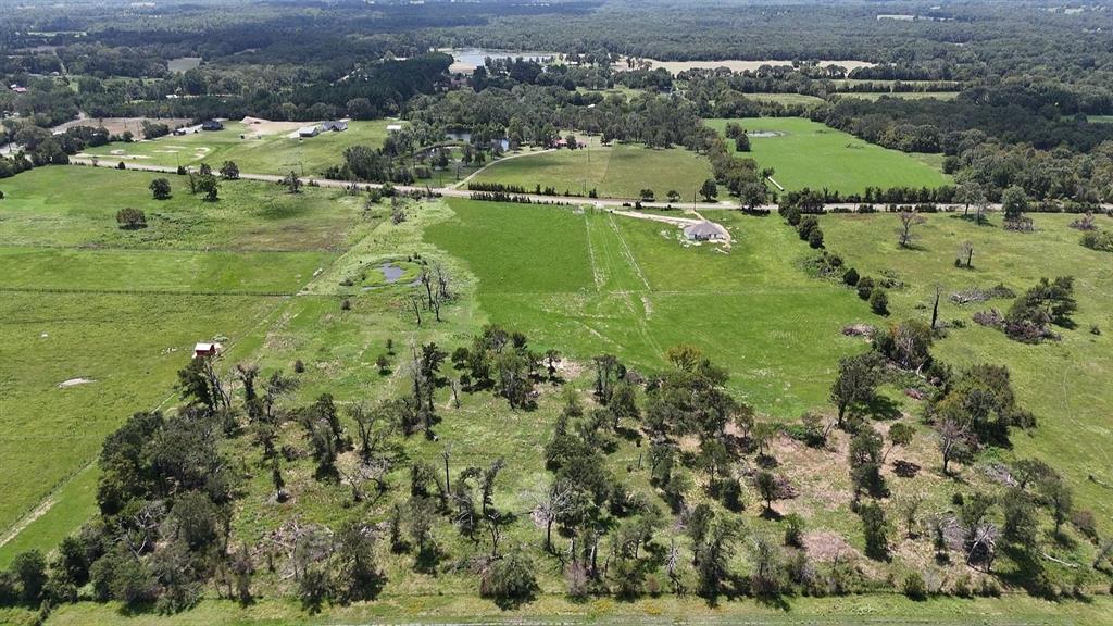 Aerial overview of property's location featuring rural landscape and a pastoral area