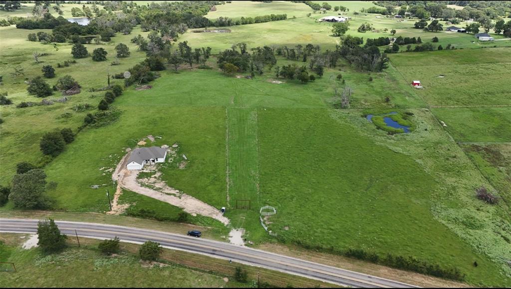Tbd Fm 1256 Athens, TX 75752 - Photo 3 of 7 Aerial view of property and surrounding area featuring rural landscape