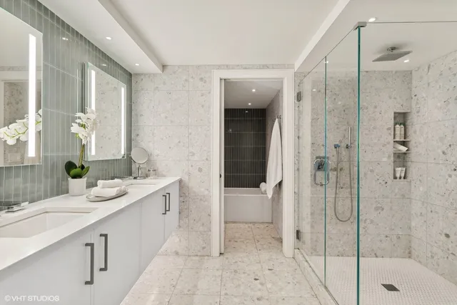 a bathroom with a bathtub and a toilet