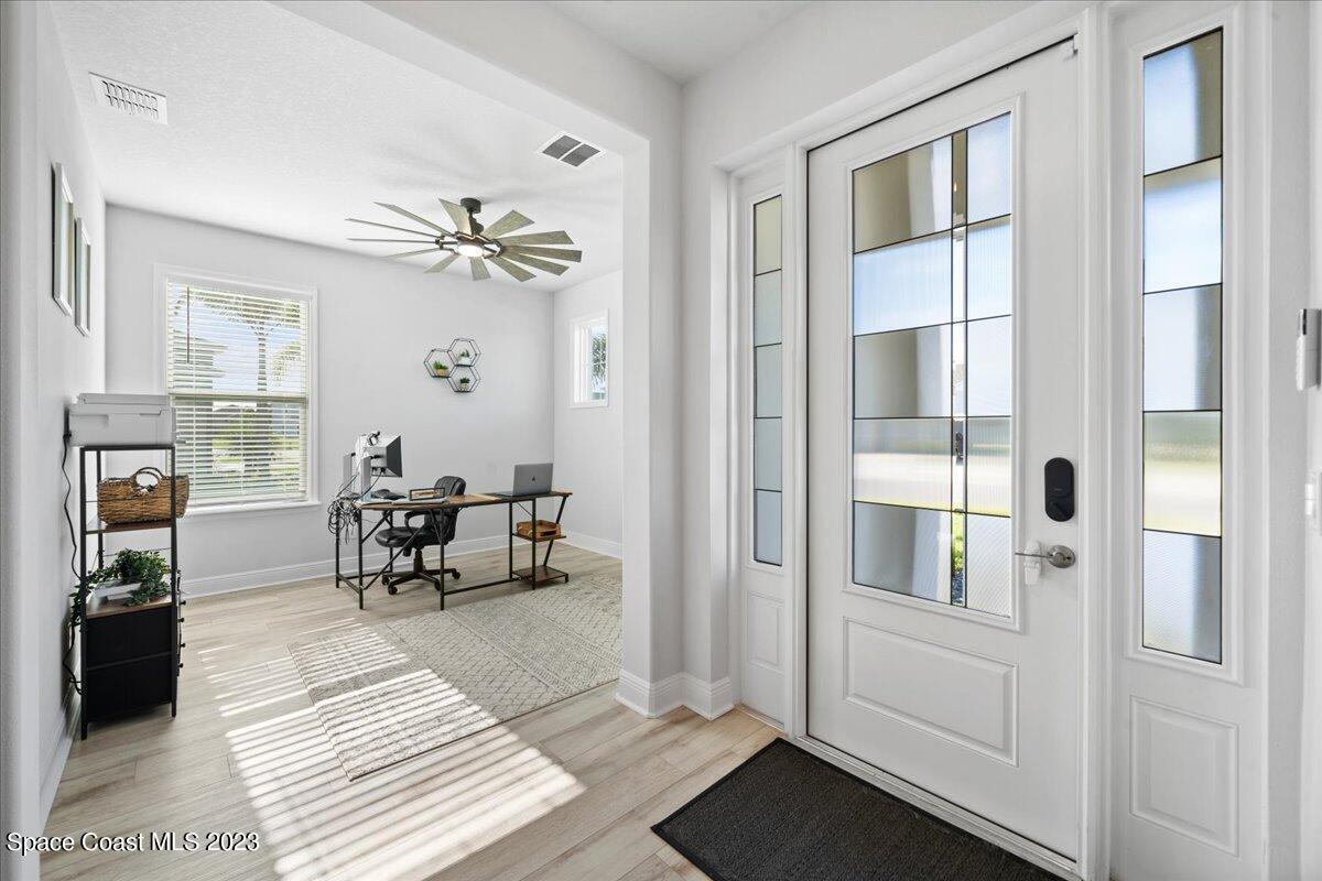 1582 Killian Drive Palm Bay, FL 32905 - Photo 13 of 37 a living room with furniture
