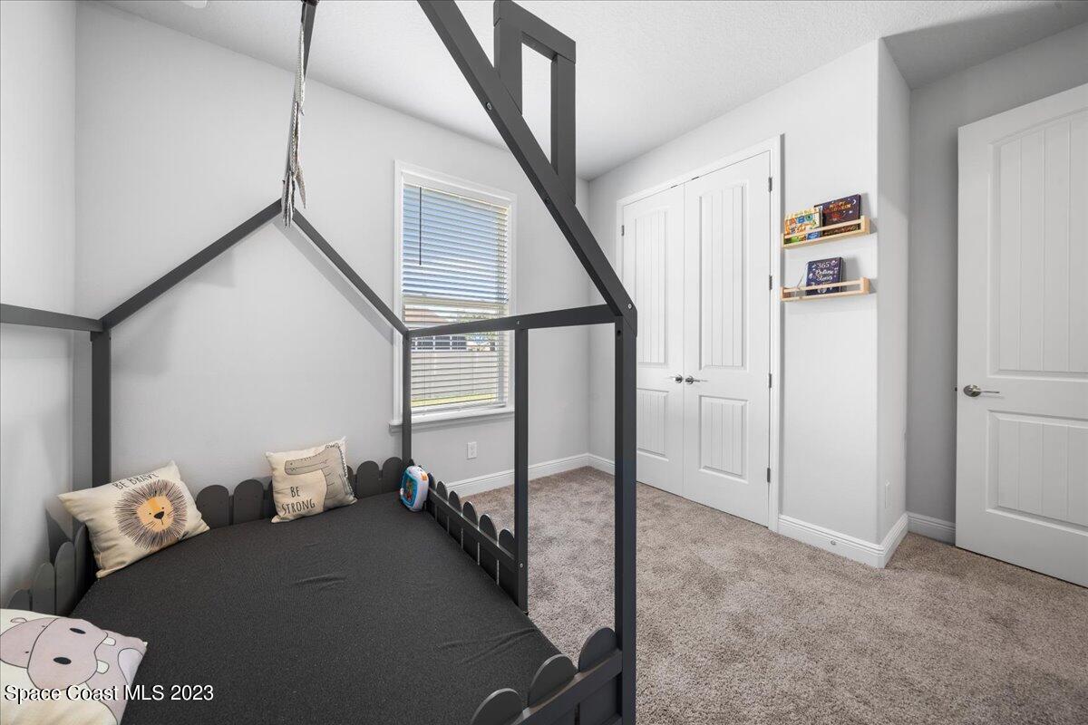 1582 Killian Drive Palm Bay, FL 32905 - Photo 21 of 37 a view of livingroom with furniture and windows