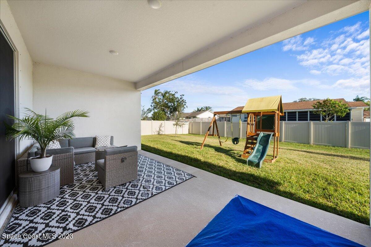 1582 Killian Drive Palm Bay, FL 32905 - Photo 26 of 37 a view of a porch with furniture