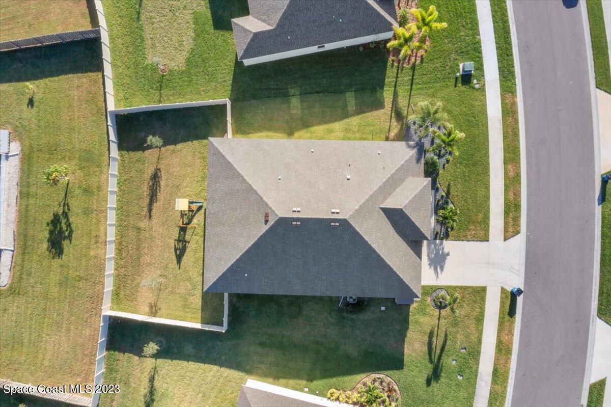 1582 Killian Drive Palm Bay, FL 32905 - Photo 31 of 37 a aerial view of a house with a yard