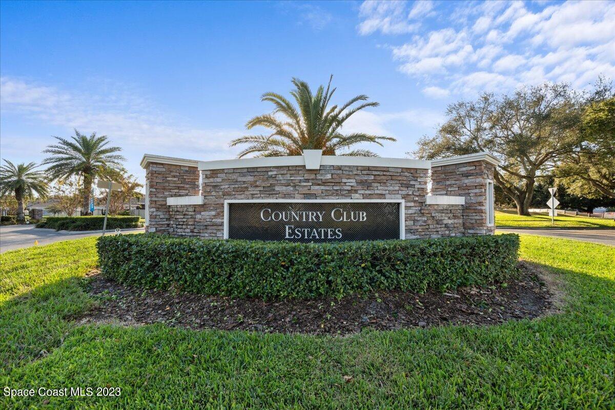 1582 Killian Drive Palm Bay, FL 32905 - Photo 34 of 37 a view of a house with a garden