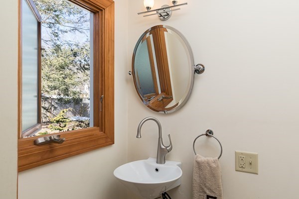 40 Crescent Road Hamilton, MA 01982 - Photo 13 of 28 a bathroom with a sink and a mirror