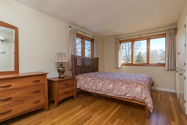 40 Crescent Road Hamilton, MA 01982 - Photo 21 of 28 a bedroom with a bed and a dresser
