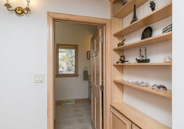 40 Crescent Road Hamilton, MA 01982 - Photo 22 of 28 a kitchen with a refrigerator and cabinets