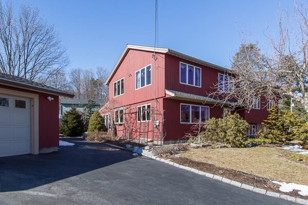 40 Crescent Road Hamilton, MA 01982 - Photo 27 of 28 a front view of a house with a yard