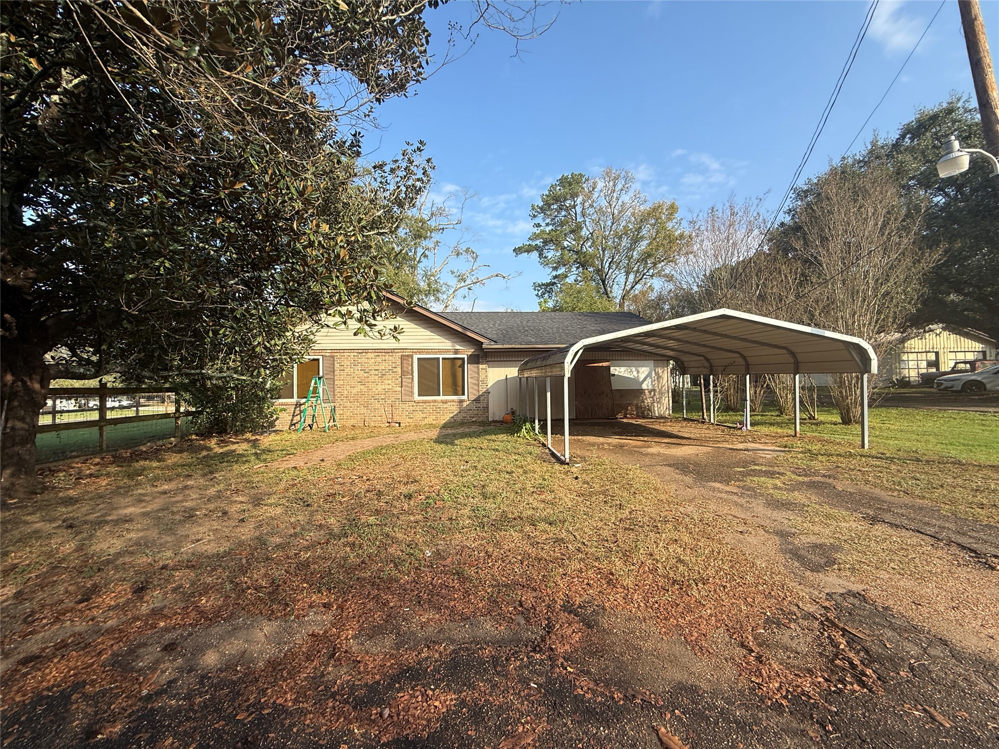 795 Highway 393 Loop Goodrich, TX 77335 - Photo 5 of 22 a front view of a house with yard