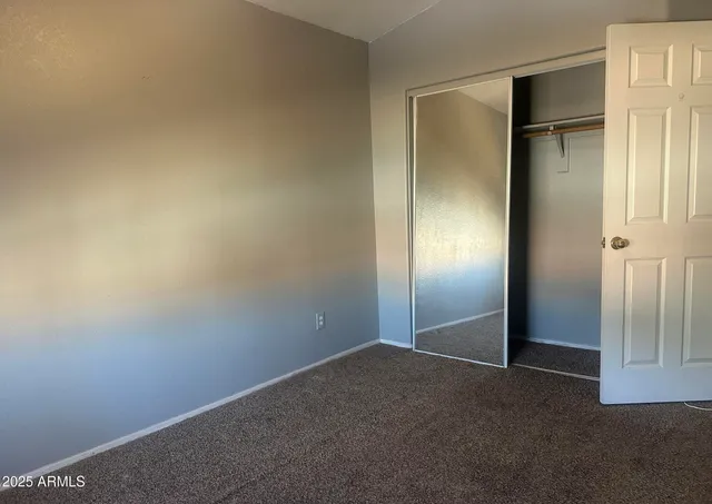 a spacious bathroom with a double vanity sink mirror and double