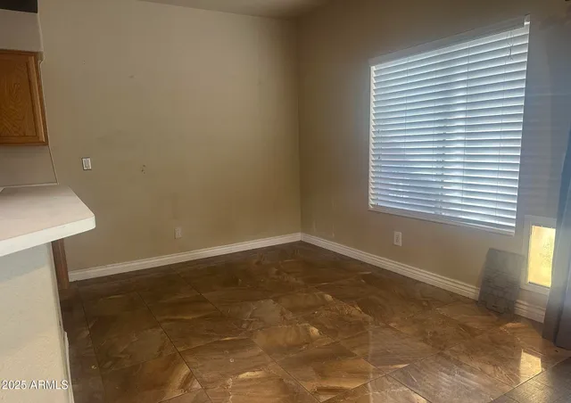 a view of a room with a window