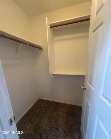 an empty room with a bench