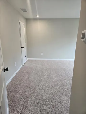 a bathroom with a sink a mirror and a toilet