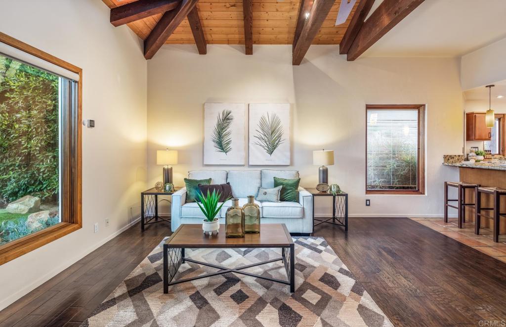 2202 Mountain Vista Drive Encinitas, CA 92024 - Photo 14 of 28 a living room with furniture and a wooden floor