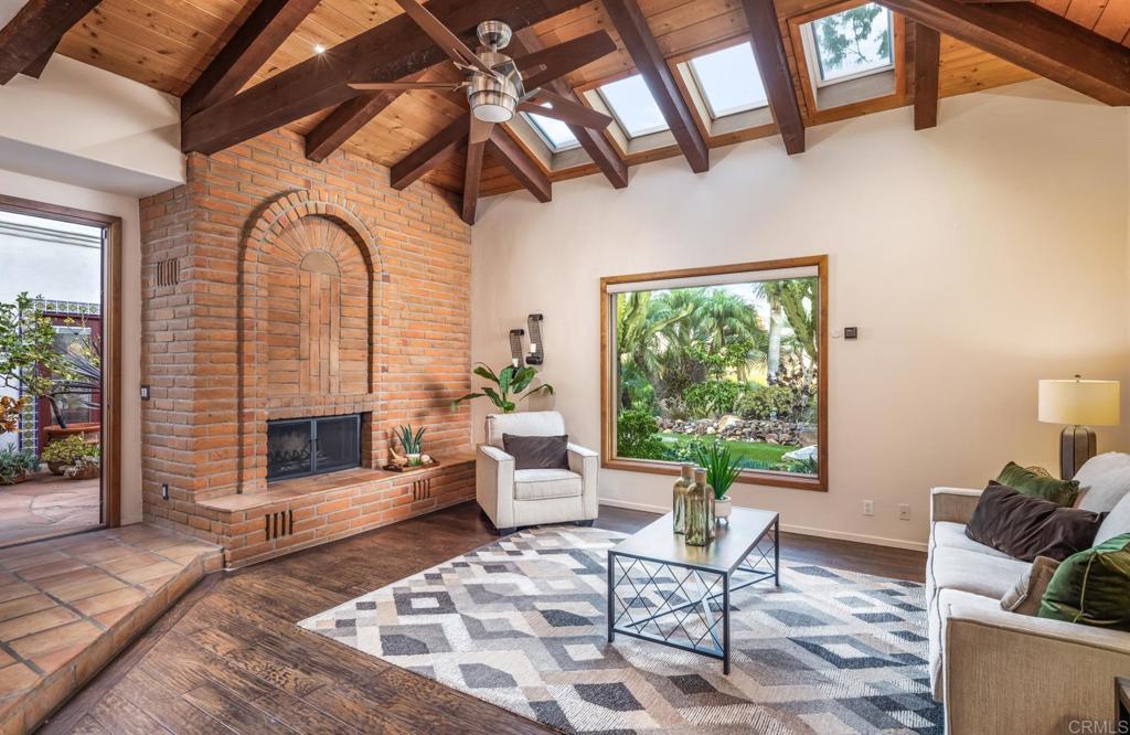 2202 Mountain Vista Drive Encinitas, CA 92024 - Photo 4 of 28 a living room with furniture and a fireplace