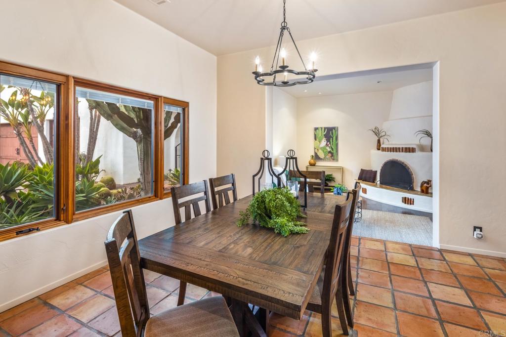 2202 Mountain Vista Drive Encinitas, CA 92024 - Photo 7 of 28 a view of a dining room with furniture window and outside view